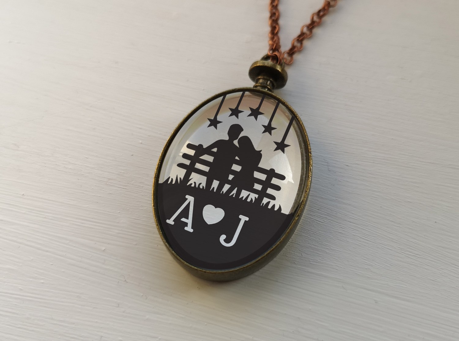 Couple sat on Bench under the stars