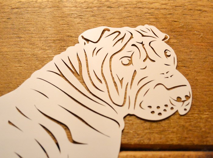 Shar Peis handcut paper art