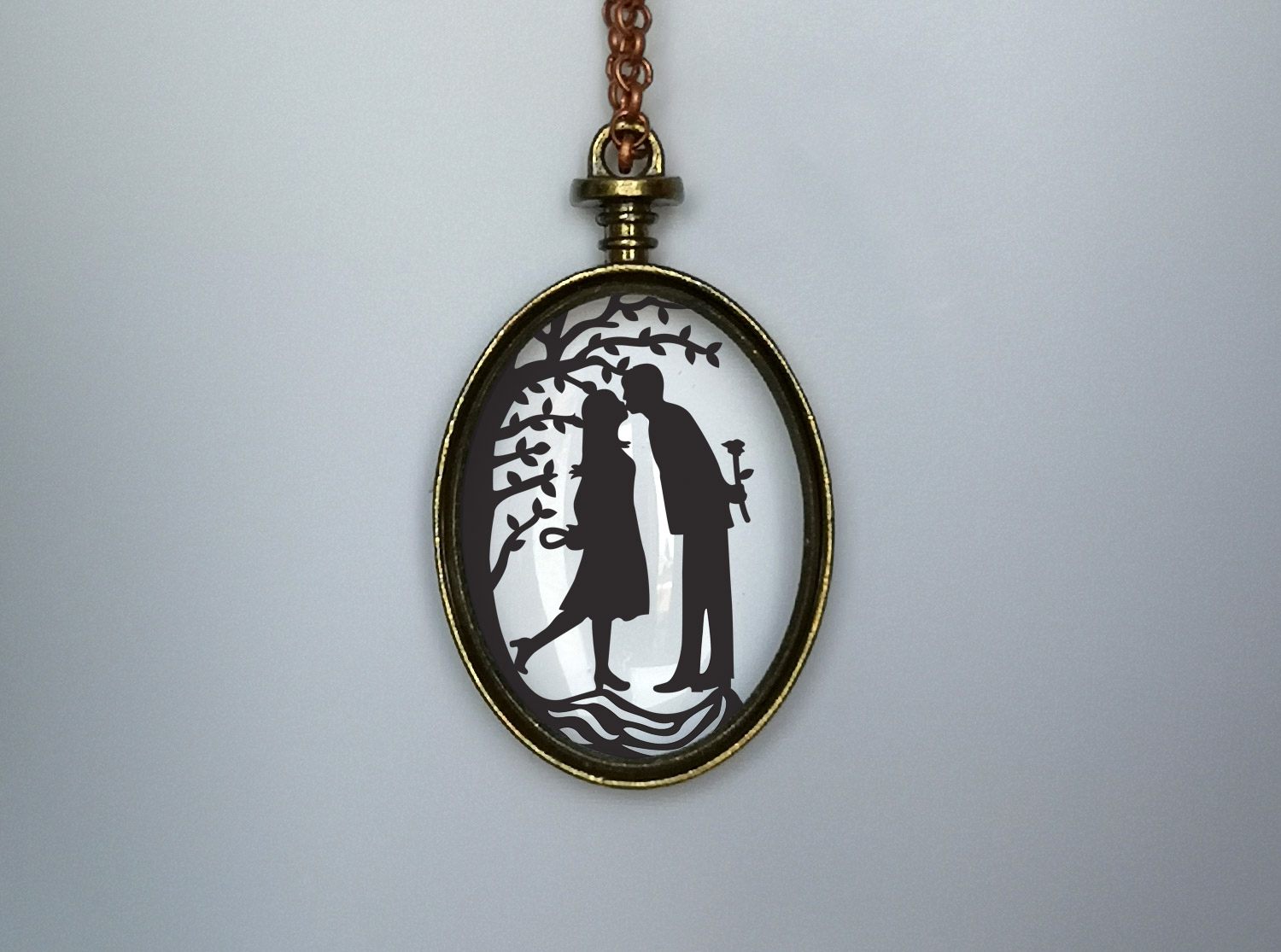 First kiss pendant necklace